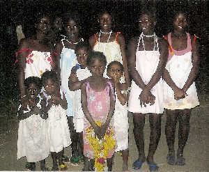 Group picture of different style dresses made for Africa